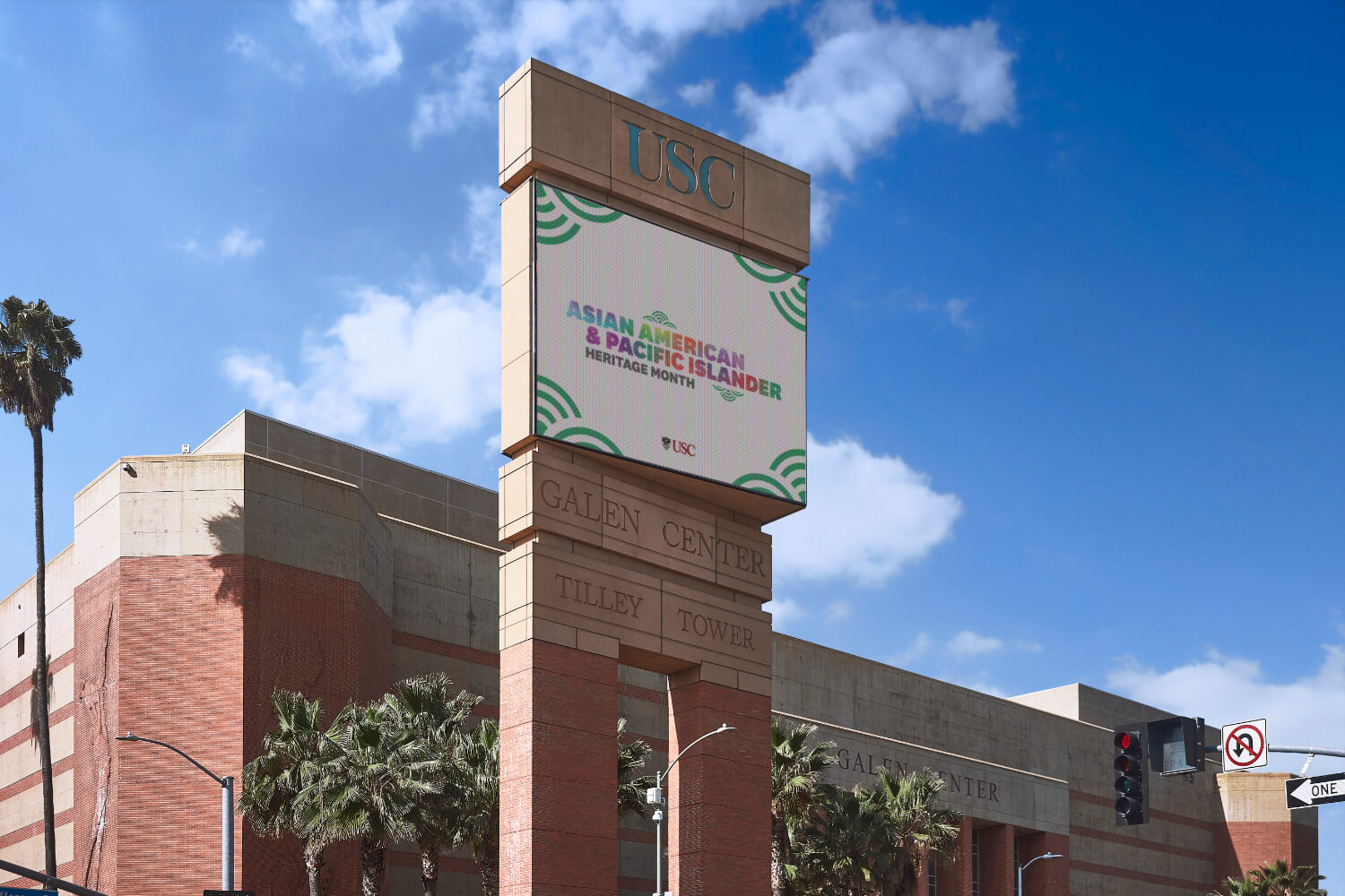 Photograph mock-up featuring the AAPI logo lock-up displayed on the Galen Center Tilley Tower screen, celebrating Asian American and Pacific Islander heritage.